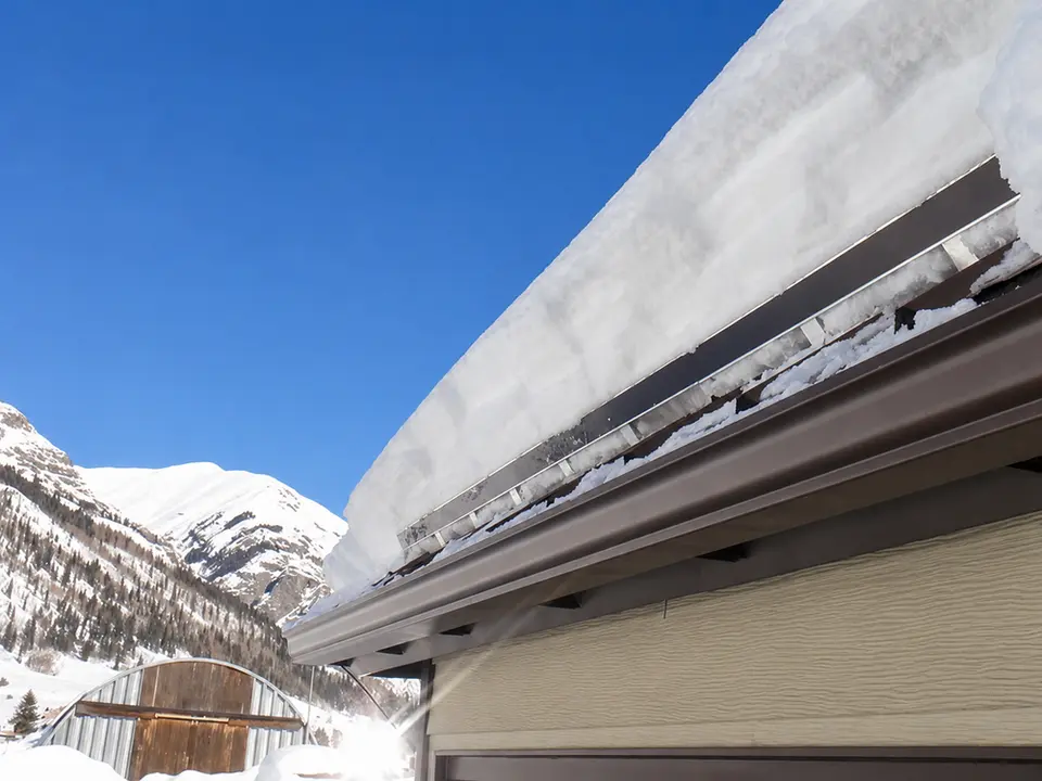 Galvanized SnoBar, aluminum ColorBar, and two-bar snow rail systems for metal roof snow retention